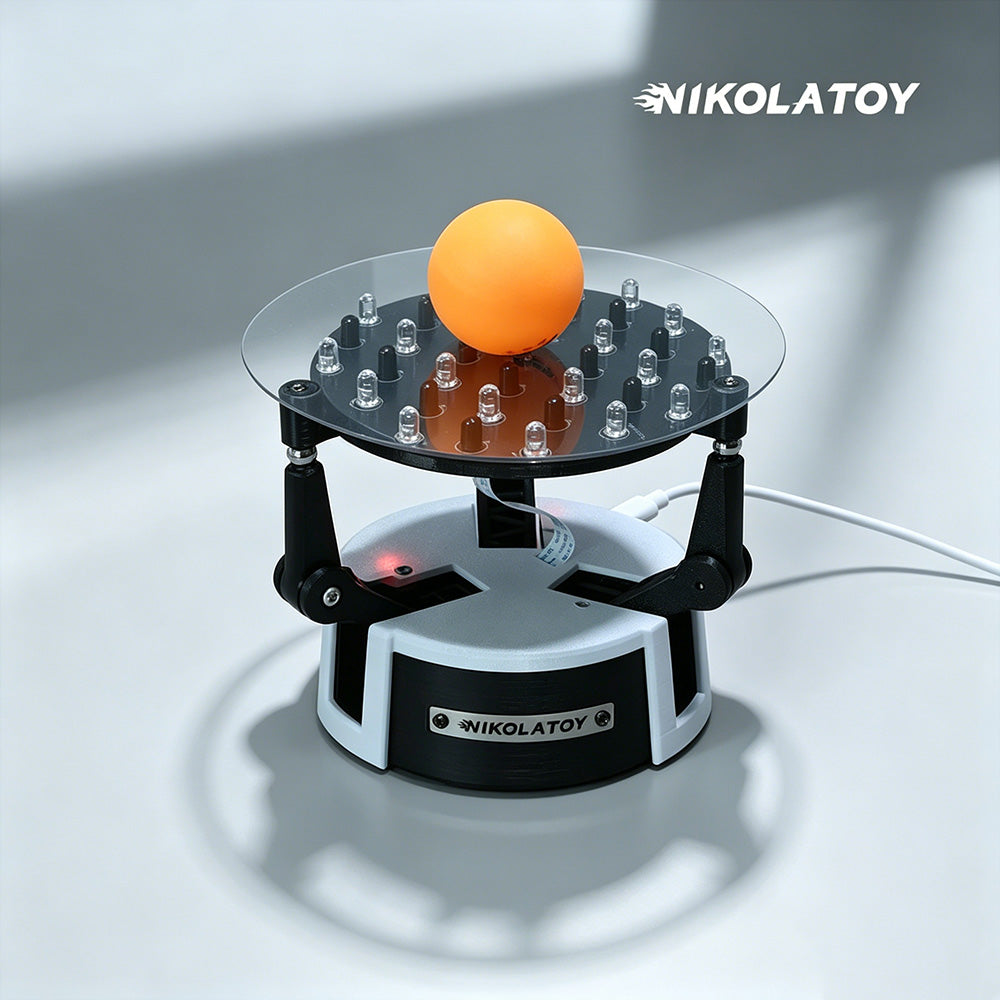 NikolaToy Balance Robot Pro Stewart platform balancing an orange ball on its infrared sensor top plate