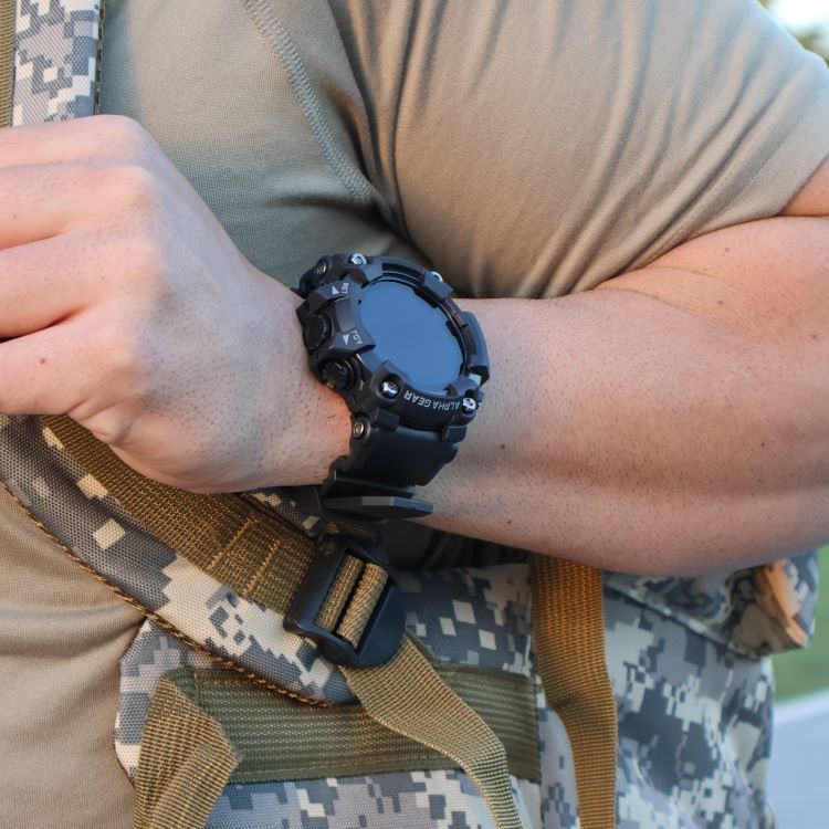 AlphaGear Delta Smartwatch worn with a tactical backpack