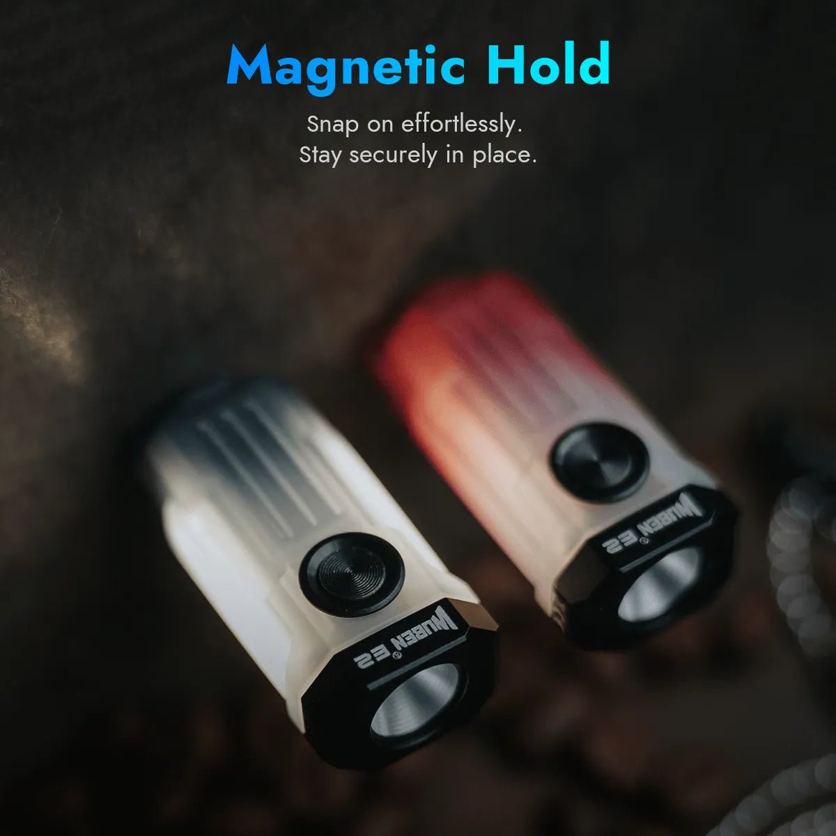 Two Wuben E2 PULSE flashlights, red and black, attached to a metal surface using their magnetic tails